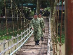 Kodim 0411/KM Rampungkan Tahap Akhir Rehab Jembatan Gantung Way Raman